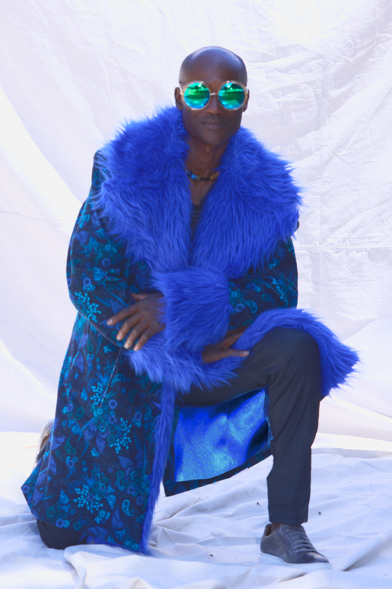 bootsy Collins style 70's coat with bright blue fur and tie-dye lining