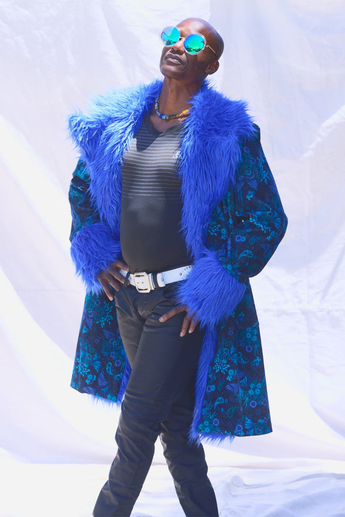 bootsy Collins style 70's coat with bright blue fur and blue satin lining