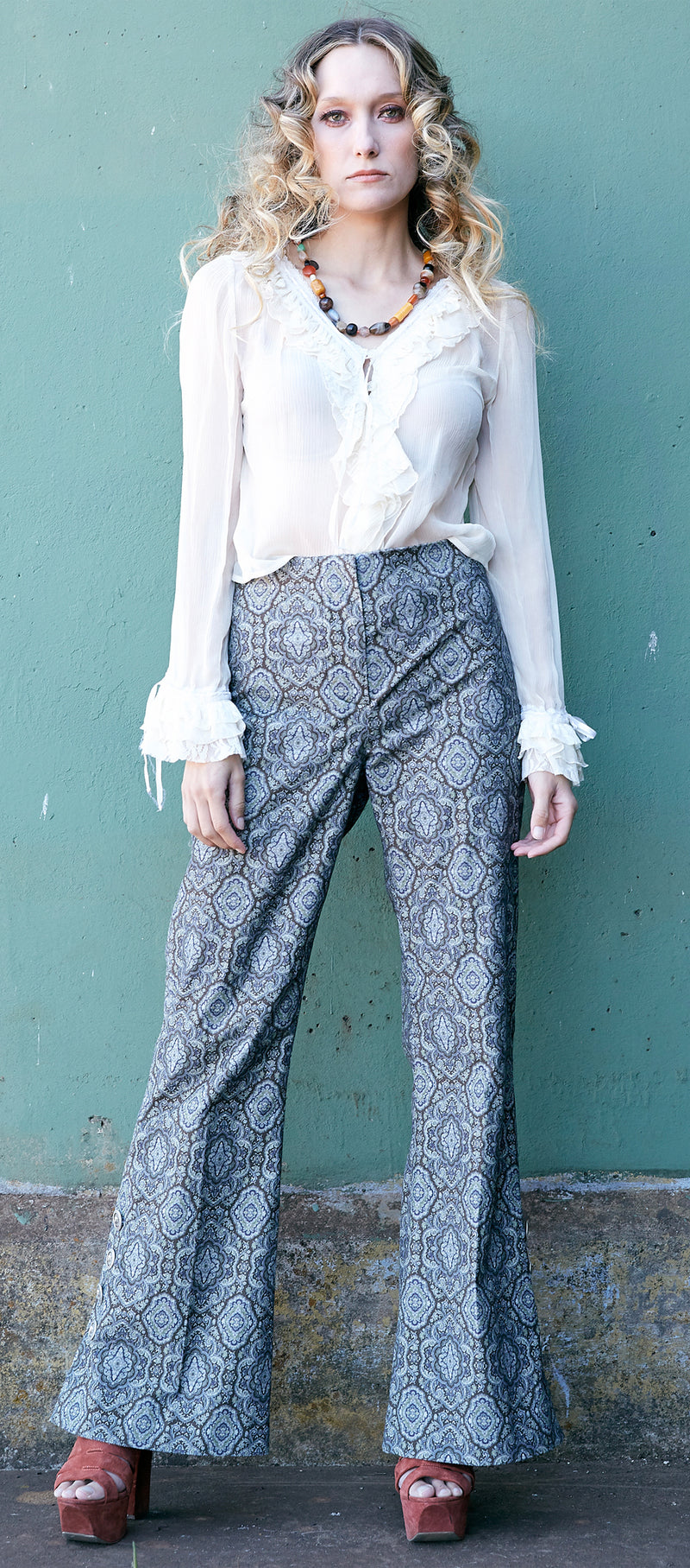 Retro chic boho style pantsuit in printed velveteen